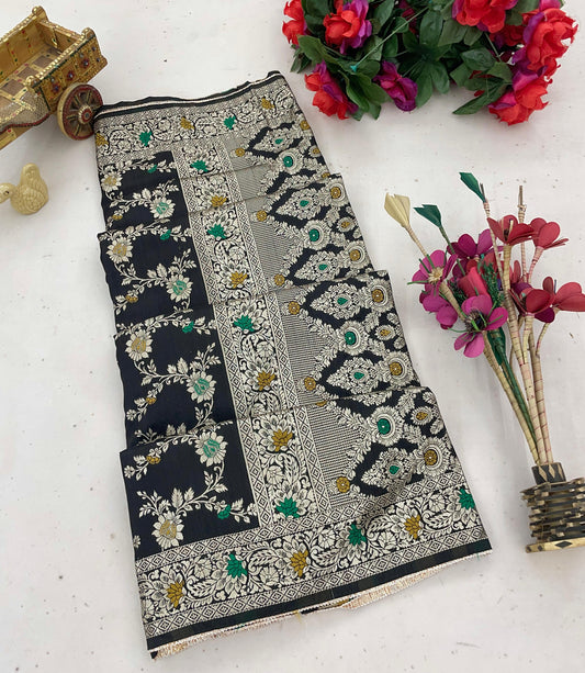 Step into elegance with the Kayra Meenakari Pure Doal saree, crafted from smooth pure Dolasilk fabric. Adorned with sparkling Meenakari work and a charming border lace, this saree adds a playful twist to traditional style. Perfect for those who love to shine with a touch of fun and flair at any celebration!